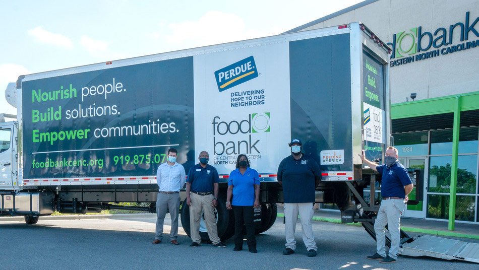 Food Bank of Central & Eastern North Carolina unveil a new refrigerated trucked provided by Perdue